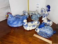 Group shot of all blue and white ceramic animal pieces