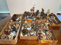 Seven shallow cartons containing assorted Boyds Bears resin figurines