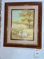 Full view of framed painting on wall