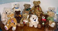 Front view of all 13 Hermann teddy bears on table