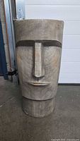 Front view of grey Easter Island head planter