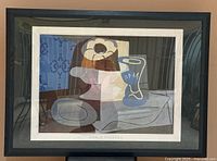 Full view of framed Picasso print with frame and mat