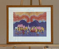 Full view of framed print on easel