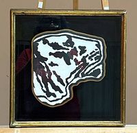 front view of framed artwork showing abstract design