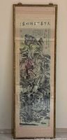 Full view of framed vertical Chinese painting showing artwork, frame, glass