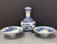 Front view of vase and both bowls