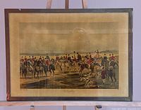 Full framed lithograph under glass on easel