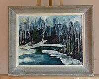 Full view of framed winter landscape painting