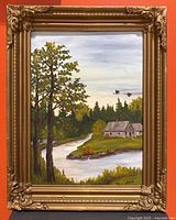 Full view of framed painting showing landscape composition and ornate frame