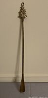 Full view of brass shoe horn