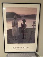 Full view of framed poster showing artwork and text