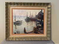 Front view of framed harbour painting