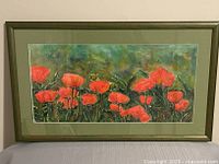 Framed watercolour painting showing poppies and full frame