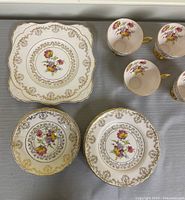 Group view showing serving plate, bowls and cups