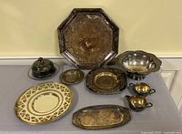 Wide shot of all silver pieces showing variety and condition