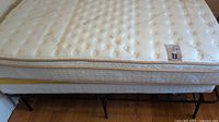 Top and side view of mattress on platform frame