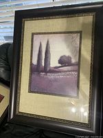 Front view of framed print showing artwork, mat, and frame