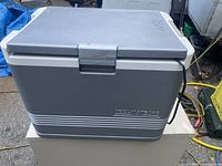 Front view of Igloo KoolMate 40C cooler showing logo, lid and attached power cord