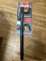 Front view of sealed The Club Basic steering wheel lock in retail package