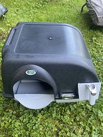 Top view of Omega Paw Roll ‘n Clean litter box showing hood, handle and waste drawer