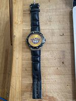 Full view of wristwatch showing strap, case, dial and bezel