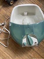 Full view of Waterpik foot spa showing basin, cord, and exterior