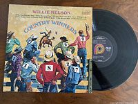 Front jacket and vinyl disc showing album art and label