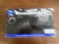 Top of retail box showing RoadRider Collection branding