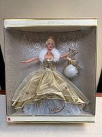 Front view of boxed 2000 Holiday Celebration Barbie and ornament
