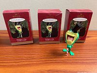 Three Hallmark Keepsake Michigan J. Frog ornaments with boxes