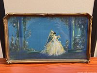 Front view of framed lithograph showing full artwork and frame