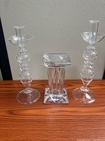 All three pieces: two Murano candlesticks and Waterford pedestal