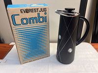 Jug standing beside original Everest Jug Combi box