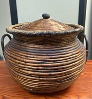 Full view of split reed basket with lid in place