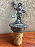Full view of pewter figurine bottle stopper