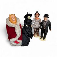 Group shot of all four Wizard of Oz dolls on stands