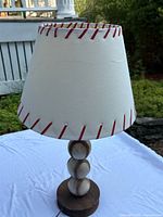 Full view of baseball lamp with shade