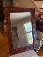 Full view of carved wood mirror