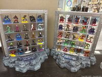 Both display cases filled with figurines