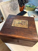 Closed wood box top view with label