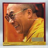 Front cover showing title, portrait of Dalai Lama, gold labels