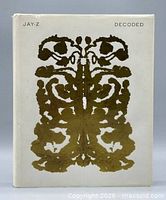 Front cover showing title, author, gold design