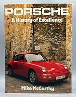 Front cover showing title, author, red Porsche 911 image