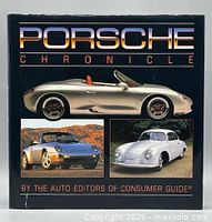 Front cover showing title and car images