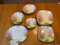 All pieces grouped on table showing pattern and variety of shapes