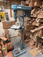 Full view of drill press with square table attached