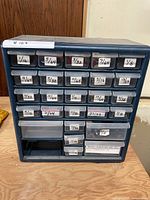 Front view of 24-drawer cabinet with labeled drawers