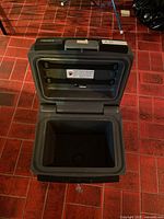 Safe open showing interior and label