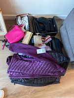Pile showing shoes, purses, jackets