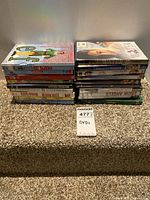 Both stacks of DVDs showing overall lot